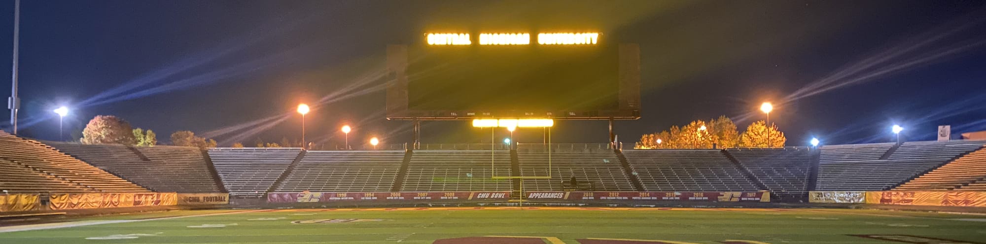 empty football stadium at night under the lights Seattle