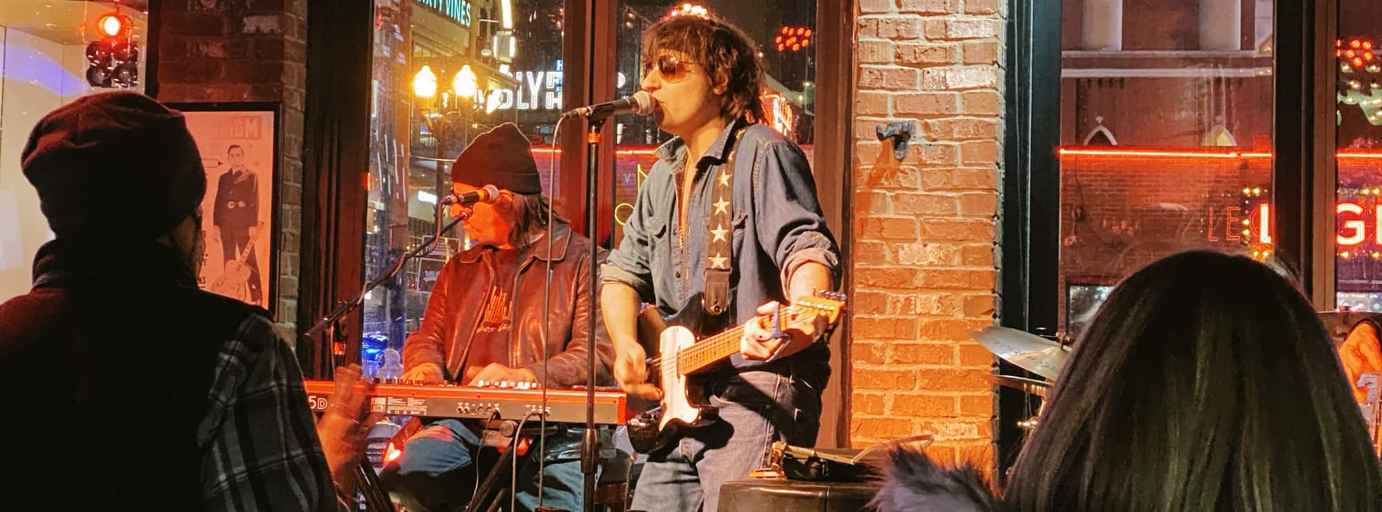 bar singer on guitar in Seattle